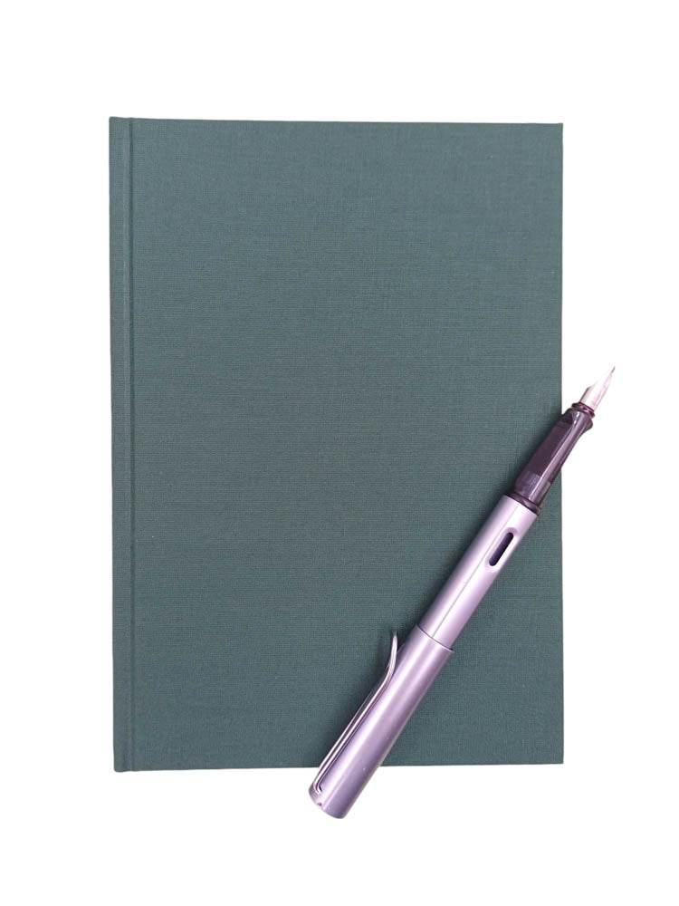 A5 linen notebook in dark green - the index bindery