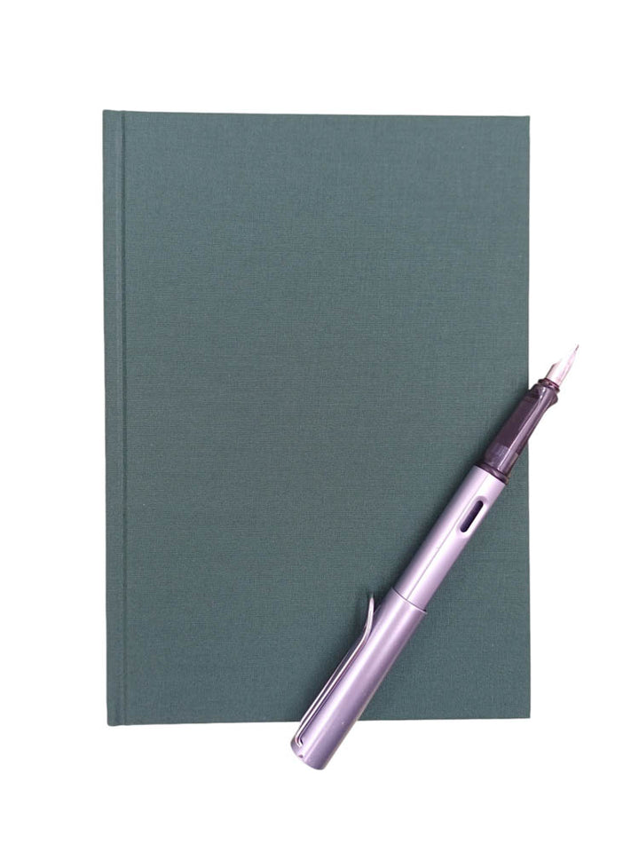 A5 linen notebook in dark green - the index bindery