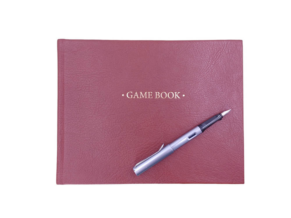 estate or game book in burgundy leather - the index bindery