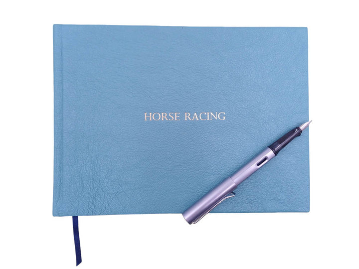 horse racing book in pale blue leather - the index bindery