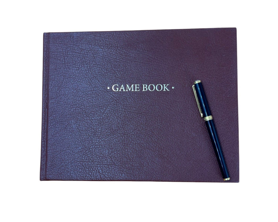 estate or game book in navy leather - the index bindery