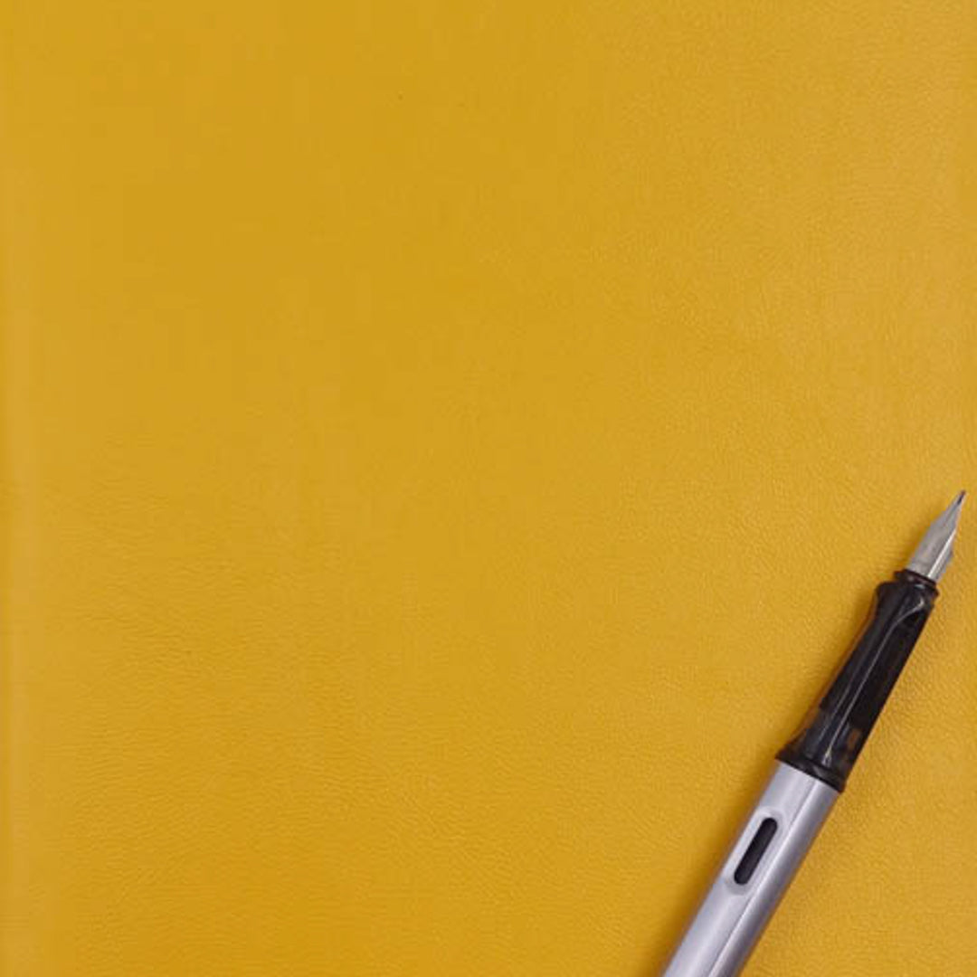 A5 soft leather notebook in yellow two- The Index Bindery